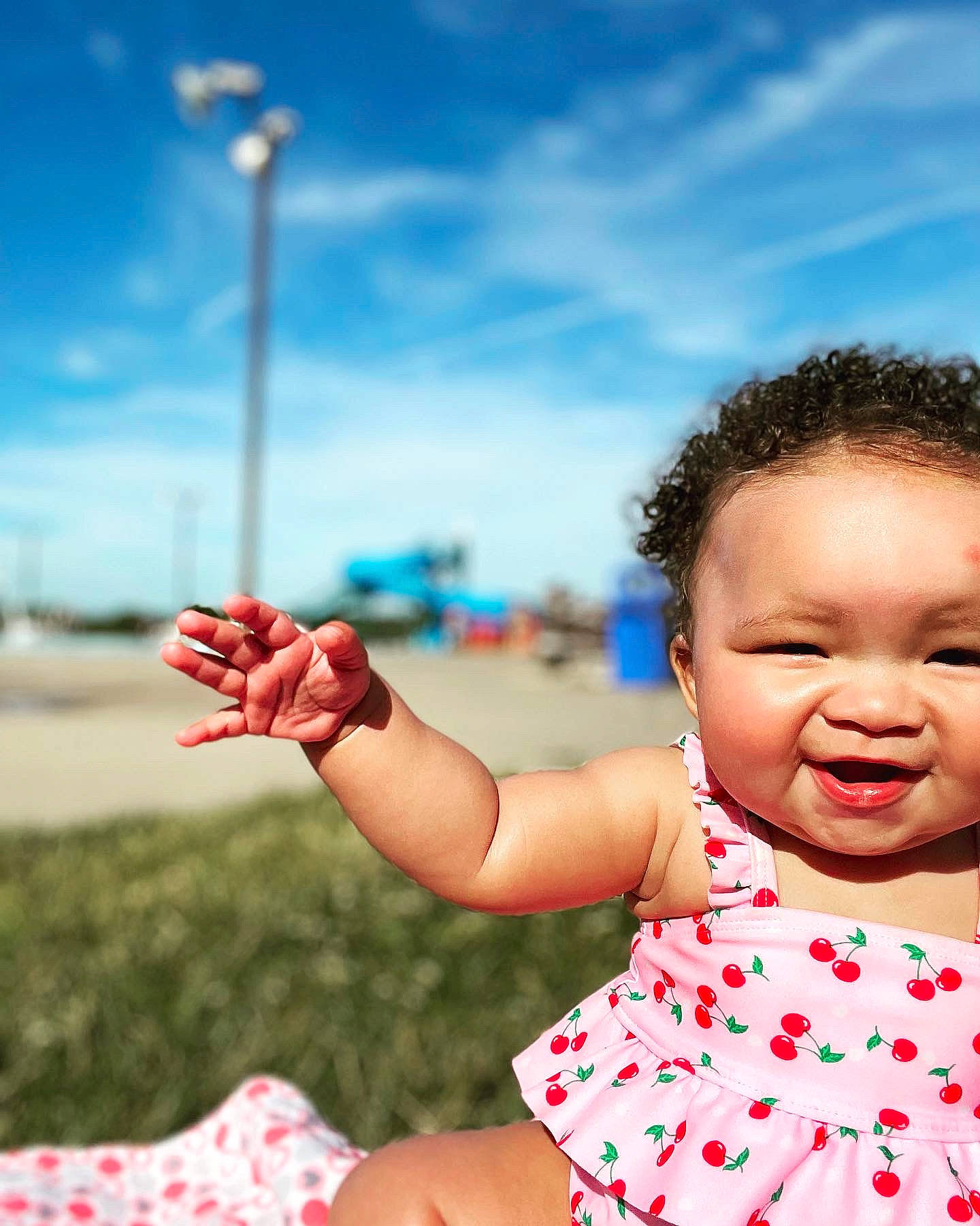 Taylynn is registered to the contest to win money with this photo: baby_toddler_clothing, child, cloud, facial_expression, finger, flash_photography, fun, gesture, happy, human, leisure, people, people_in_nature, person, photograph, pink, skin, sky, summer, toddler