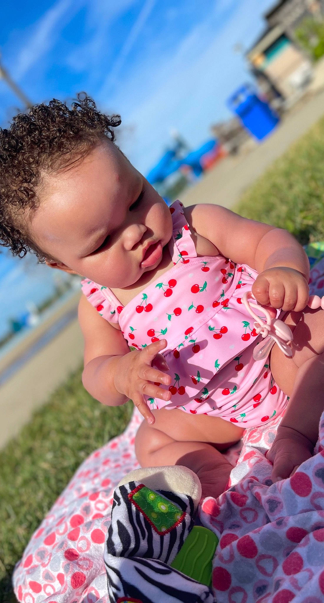 Taylynn is registered to the contest to win money with this photo: baby, baby_toddler_clothing, child, event, fun, grass, happy, leisure, nail, pattern, people_in_nature, person, play, portrait_photography, recreation, sitting, skin, sky, thigh, toddler