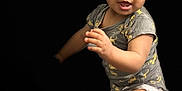 Aiden joined the competition — help win amazing prizes! black_background, child, curly_hair, cute, diaper, exploring, expression, eyes, face, feet, fingers, grey_shirt, hand, isolated, legs, mouth, portrait, skin, standing, toddler