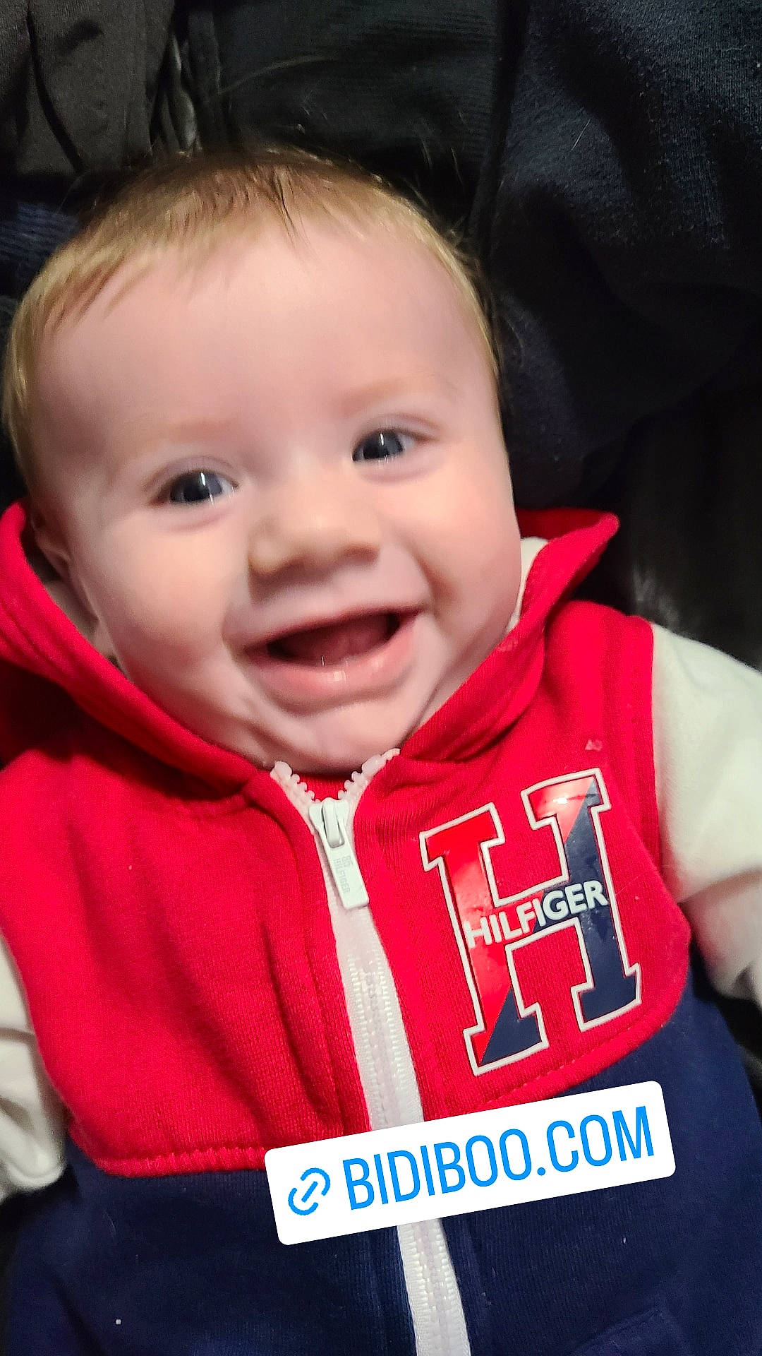 Michael is registered to the contest to win money with this photo: baby, baby_toddler_clothing, cheek, chin, cool, eye, eyebrow, facial_expression, happy, iris, jacket, jersey, lip, mouth, nose, outerwear, person, skin, sleeve, smile