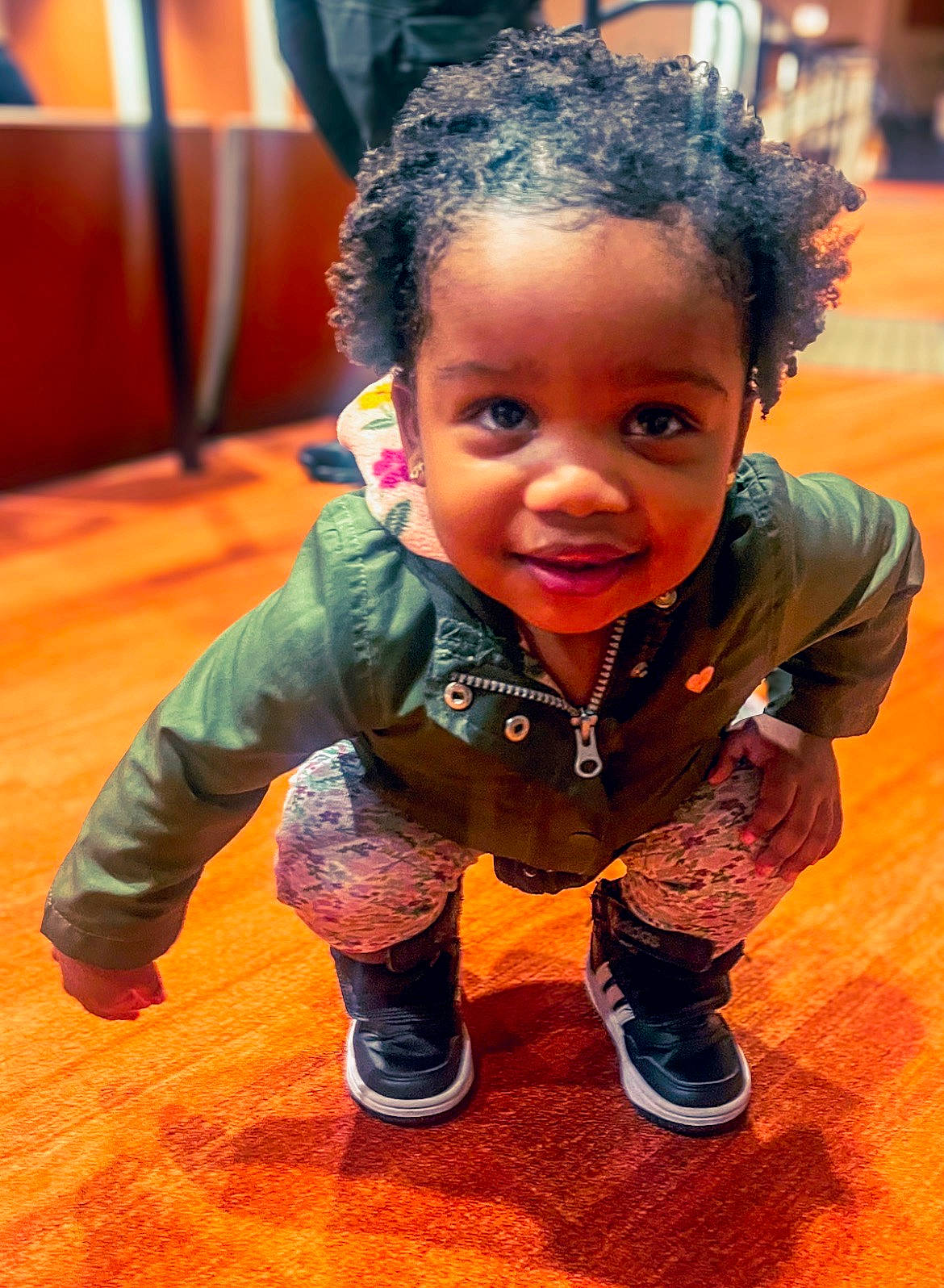 Robin is registered to the contest to win money with this photo: baby, baby_toddler_clothing, cheek, child, floor, flooring, fun, happy, hardwood, head, joy, leisure, nose, person, portrait_photography, room, sitting, skin, smile, toddler