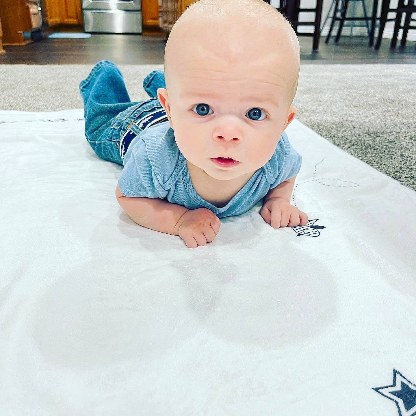 Kooper joined the competition — help win amazing prizes! baby, baby_toddler_clothing, cheek, comfort, crawling, eye, floor, flooring, happy, hardwood, head, iris, linens, nose, person, skin, sleeve, thumb, toddler, white