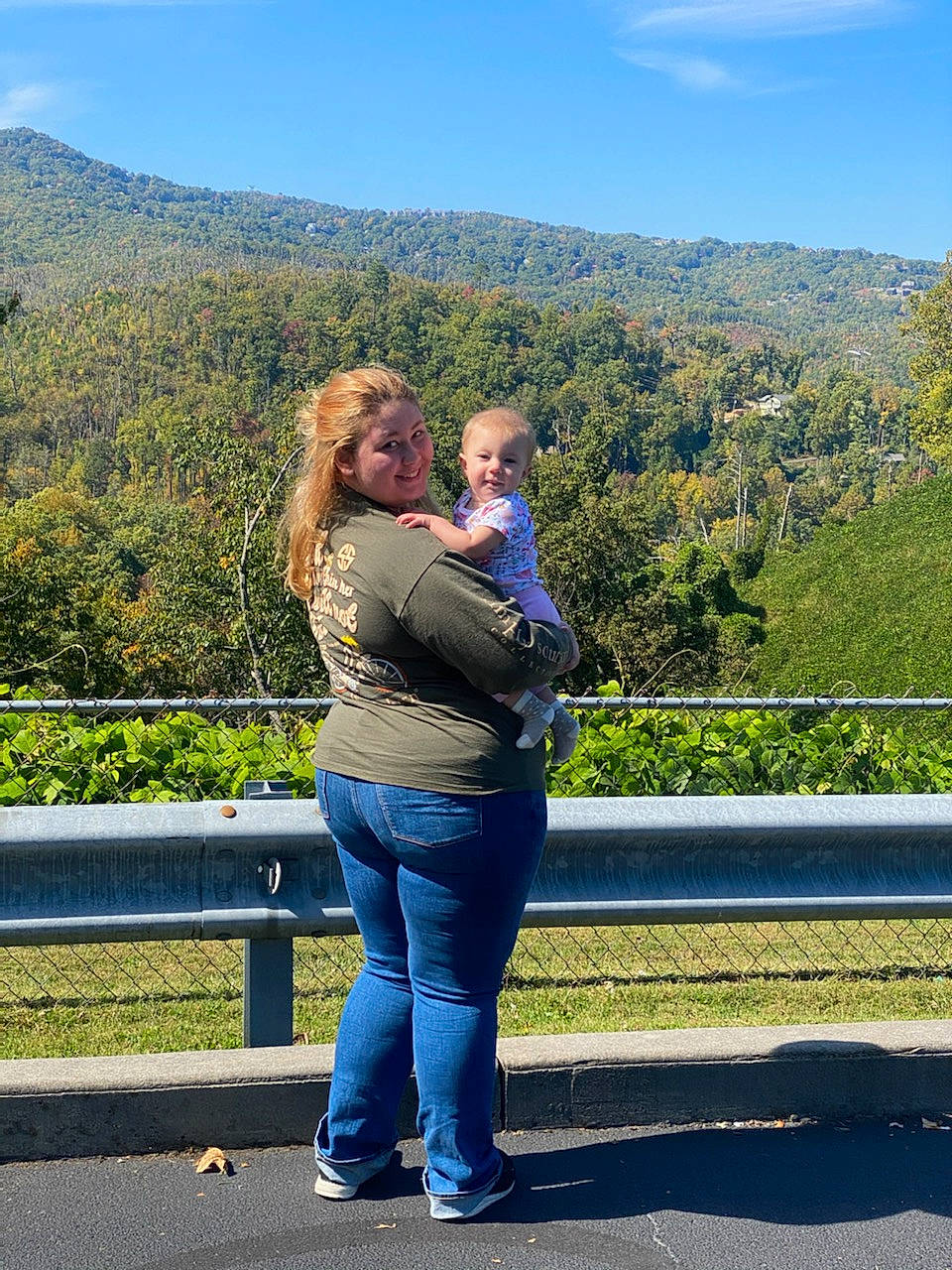Kinsley joined the competition — help win amazing prizes! electric_blue, event, fence, fun, gesture, grass, happy, hill, honeymoon, jeans, joy, landscape, leisure, mountain, mountainous_landforms, natural_landscape, people_in_nature, person, recreation, road