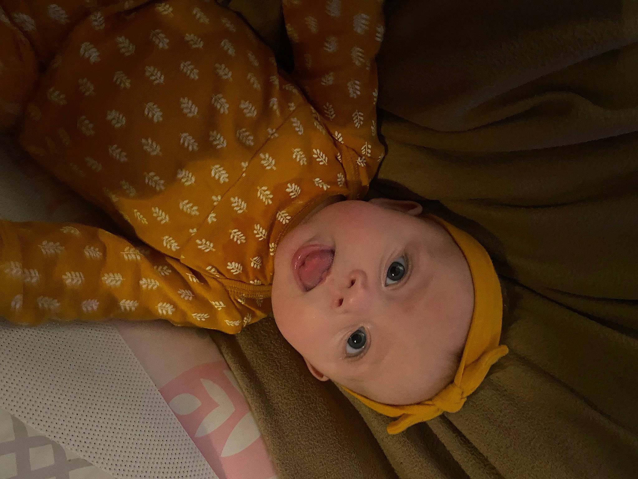 Caroline is registered to the contest to win money with this photo: baby, baby_products, baby_safety, baby_sleeping, baby_toddler_clothing, bedtime, cheek, child, comfort, flooring, human_body, linens, pattern, person, room, sleep, toddler, wood