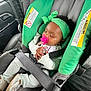 Nevaeh joined the competition — help win amazing prizes! baby, car_seat, sleeping, pacifier, headband, clothing, seat_belt, child, infant, car_interior, green, gray, safety, cute, hands, footwear, peaceful, transportation, resting, toddler