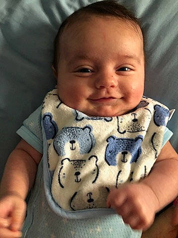 Solaire is registered to the contest to win money with this photo: baby, cheek, child, face, finger, forehead, hand, head, joy, nose, person, smile, toddler