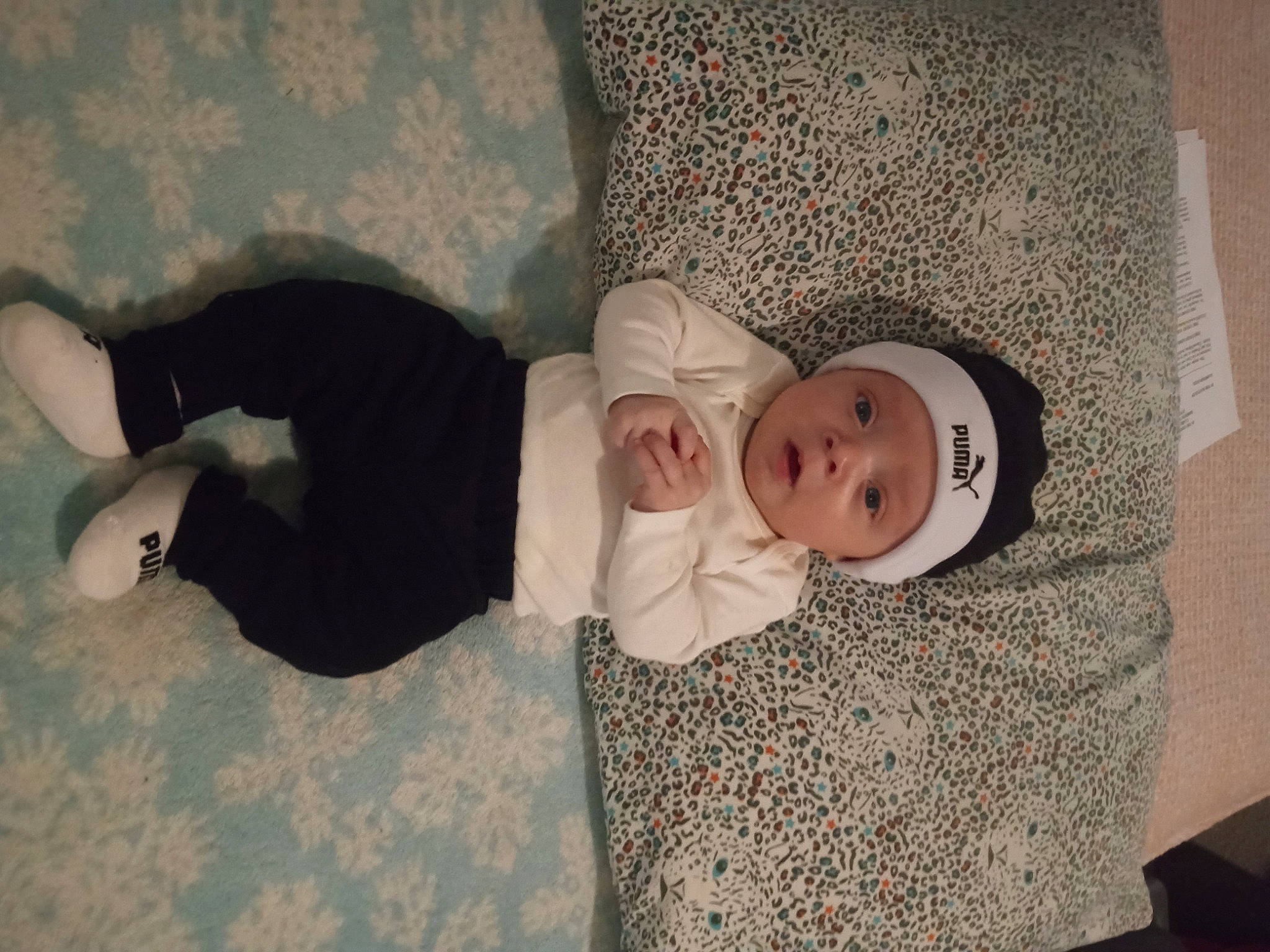 Kashton joined the competition — help win amazing prizes! baby, baby_products, baby_toddler_clothing, child, comfort, flooring, hardwood, headwear, human_leg, linens, pattern, person, room, sitting, sleeve, toddler, tree, wood