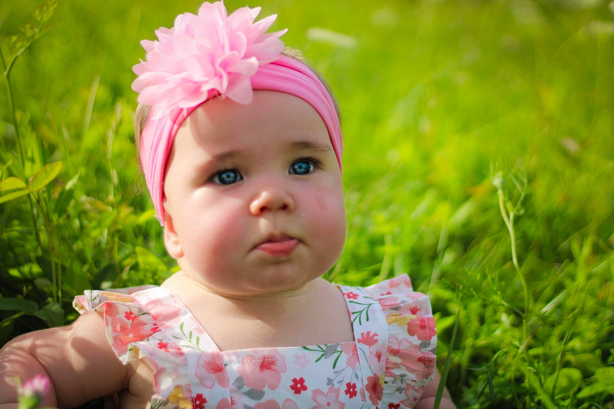 Ella joined the competition — help win amazing prizes! baby, baby_toddler_clothing, beauty, botany, cheek, child, eye, face, grass, happy, hat, headband, headpiece, headwear, lip, magenta, people_in_nature, person, pink, plant