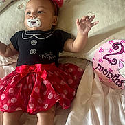 Nazaria joined the competition — help win amazing prizes! baby, infant, pacifier, red_bow, minnie_mouse, dress, polka_dots, bed, blanket, pillow, milestone_card, 2_months, cute, child, person, headband, socks, lying_down, soft_lighting, indoors