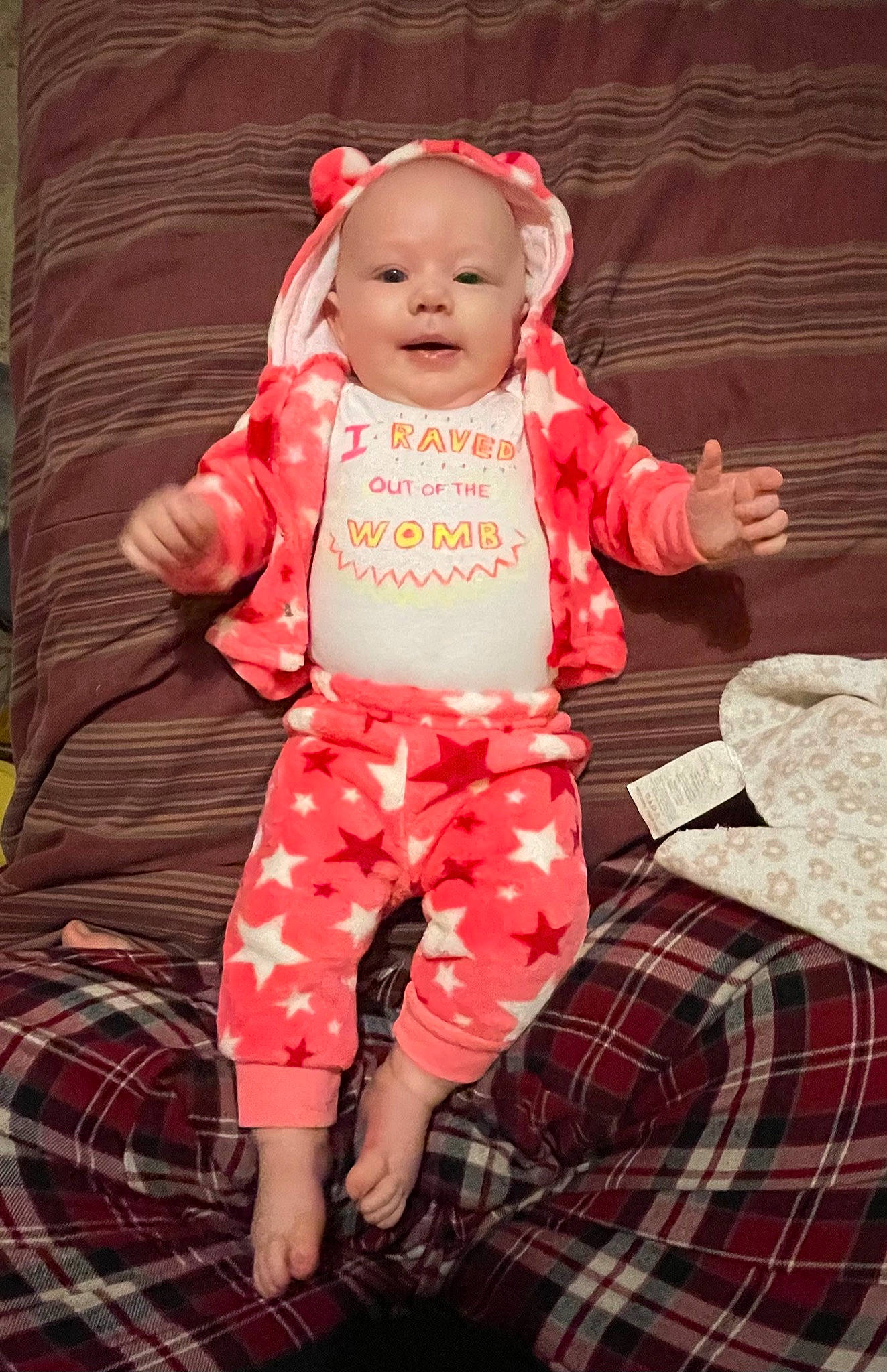 Aubriella is registered to the contest to win money with this photo: baby, baby_toddler_clothing, child, comfort, design, event, eye, fun, happy, head, pattern, person, pink, plaid, red, sitting, skin, sleeve, smile, tartan