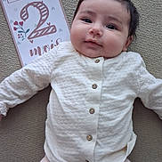 Lïa participe au concours pour gagner de l'argent avec cette photo : baby, infant, smile, milestone_card, clothing, white_shirt, pink_pants, lying_down, face, head, cute, child, two_months, milestone, soft_texture, portrait, young_child, indoors, person, baby_girl