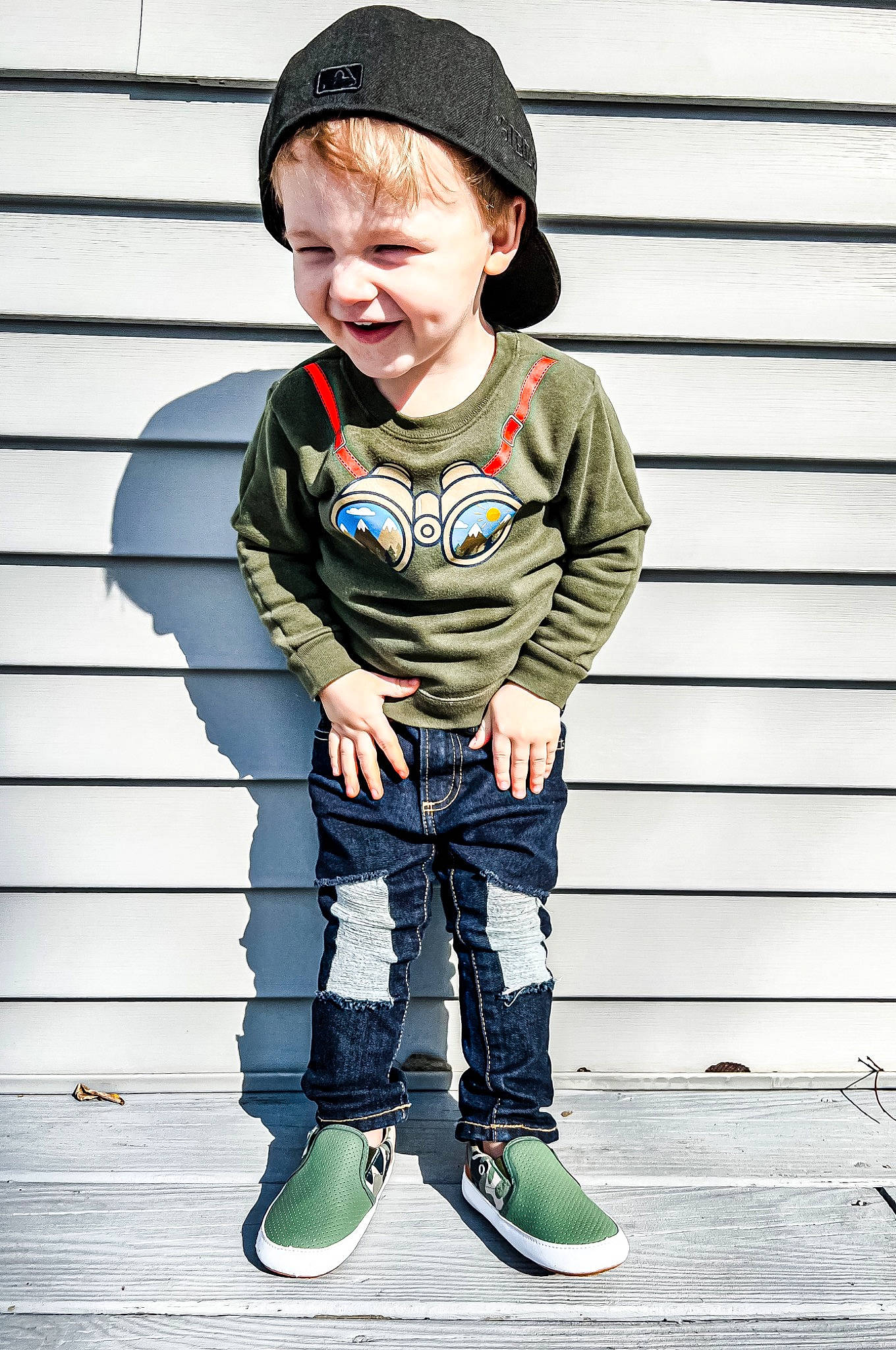 Zayne is registered to the contest to win money with this photo: baby_toddler_clothing, cap, child, collar, denim, electric_blue, face, fashion_accessory, fashion_design, flash_photography, happy, pattern, person, photograph, sleeve, smile, standing, street_fashion, t_shirt, toddler