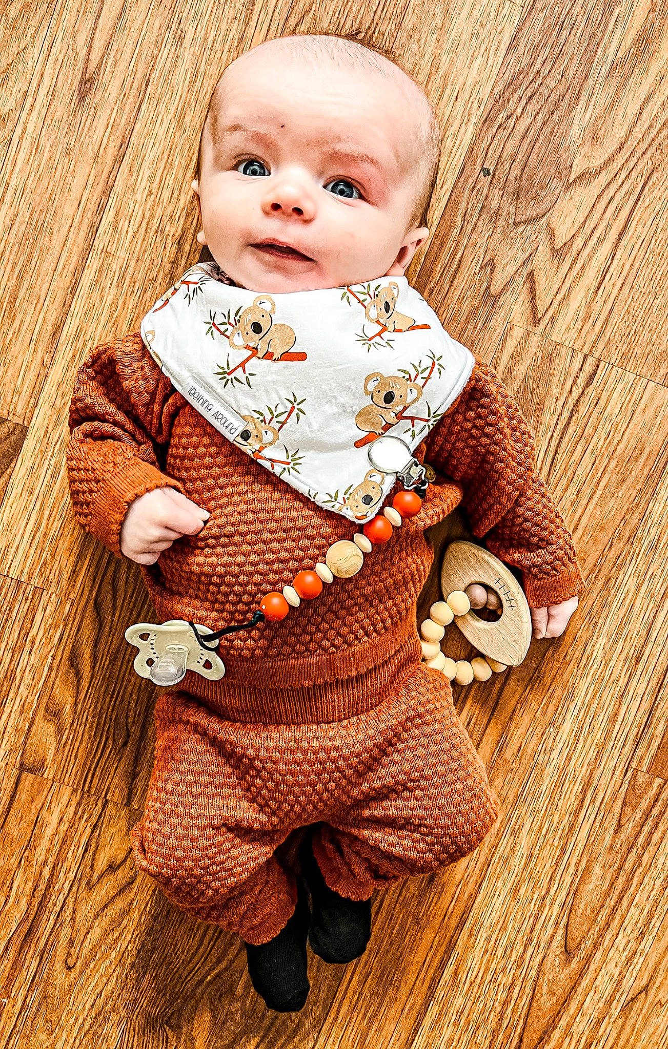 Ryker is registered to the contest to win money with this photo: art, baby_toddler_clothing, baby_toys, button, crochet, doll, eyelash, fashion_design, hardwood, outerwear, pattern, peach, person, sleeve, toy, vintage_clothing, wig, wood, wool, woolen