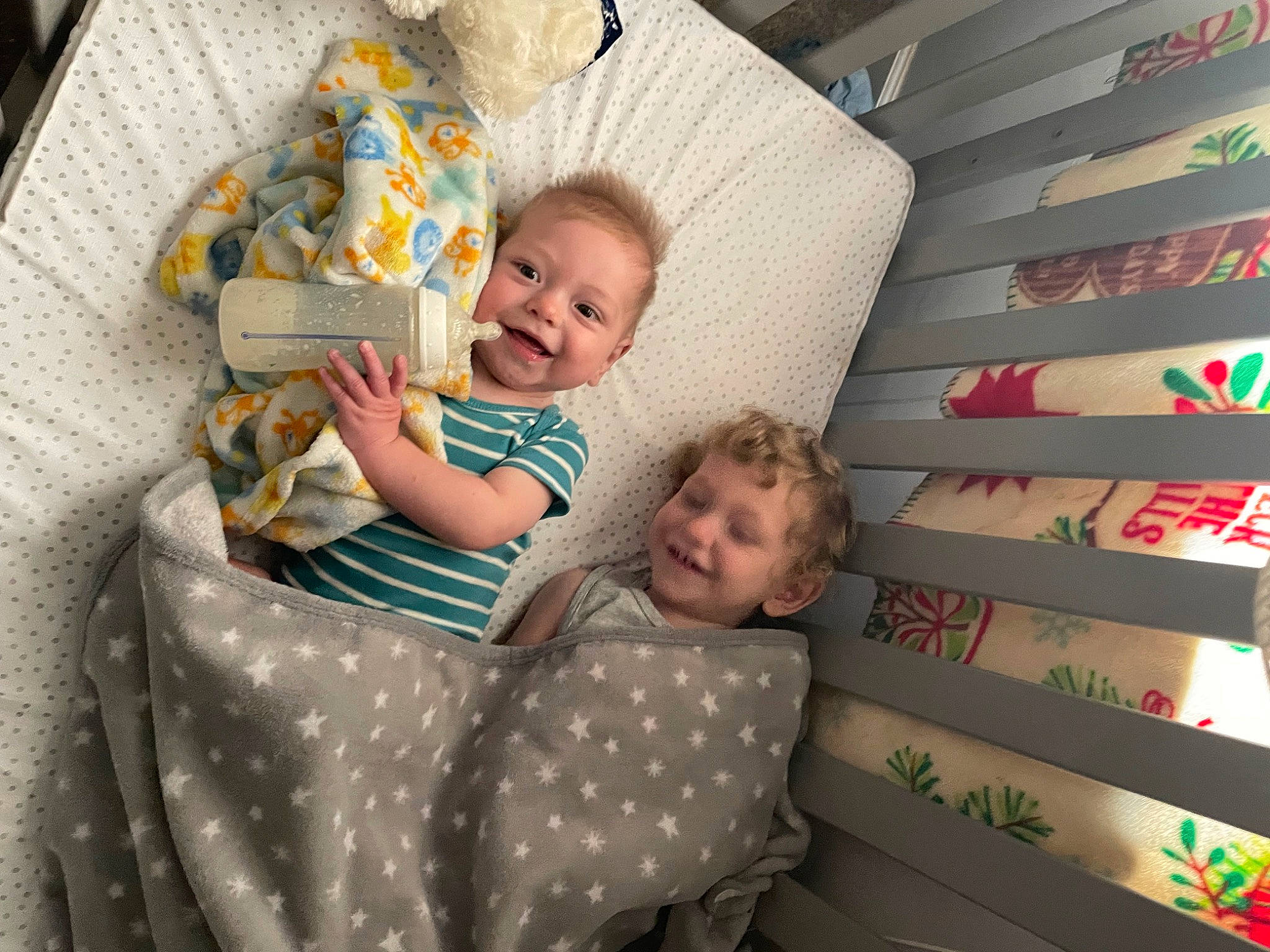 Brandon joined the competition — help win amazing prizes! baby, baby_products, baby_toddler_clothing, bedding, child, comfort, couch, facial_expression, fun, happy, joy, lap, linens, living_room, pattern, person, play, room, sitting, smile