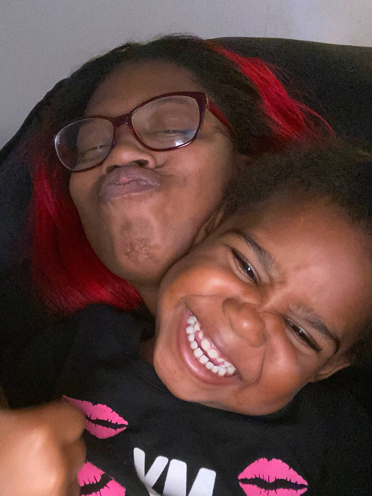 Kailyn is registered to the contest to win money with this photo: black_hair, cheek, chin, cool, eyebrow, eyewear, facial_expression, forehead, fun, glasses, happy, interaction, iris, joy, lip, mouth, nose, organ, person, smile