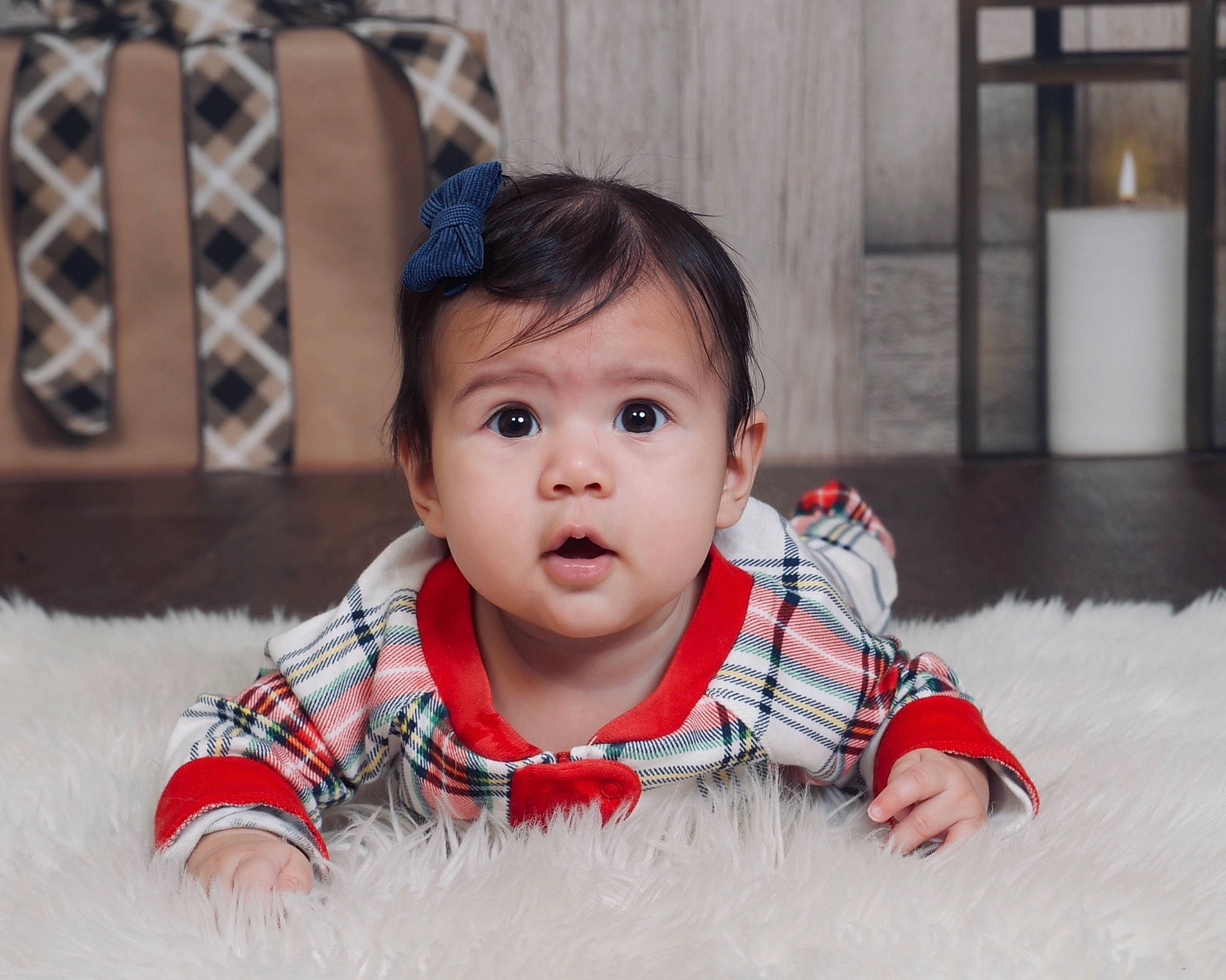 Elora is registered to the contest to win money with this photo: baby, baby_toddler_clothing, cheek, child, flash_photography, floor, flooring, fun, happy, leisure, nose, pattern, person, portrait_photography, sitting, skin, sleeve, smile, surprise, t_shirt