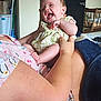 Wrenlee Jean is registered to the contest to win money with this photo: baby, babylaughing, bed, bedroom, clothing, diaper, dress, face, furniture, happy, head, indoors, laughing, newborn, person, photography, portrait, room, shorts, t_shirt