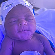 Nael joined the competition — help win amazing prizes! newborn, baby, infant, sleeping, portrait, face, hospital, cap, hat, blanket, bedding, blue_light, closeup, indoors, eyes_closed, peaceful, skin, head, child, photograph