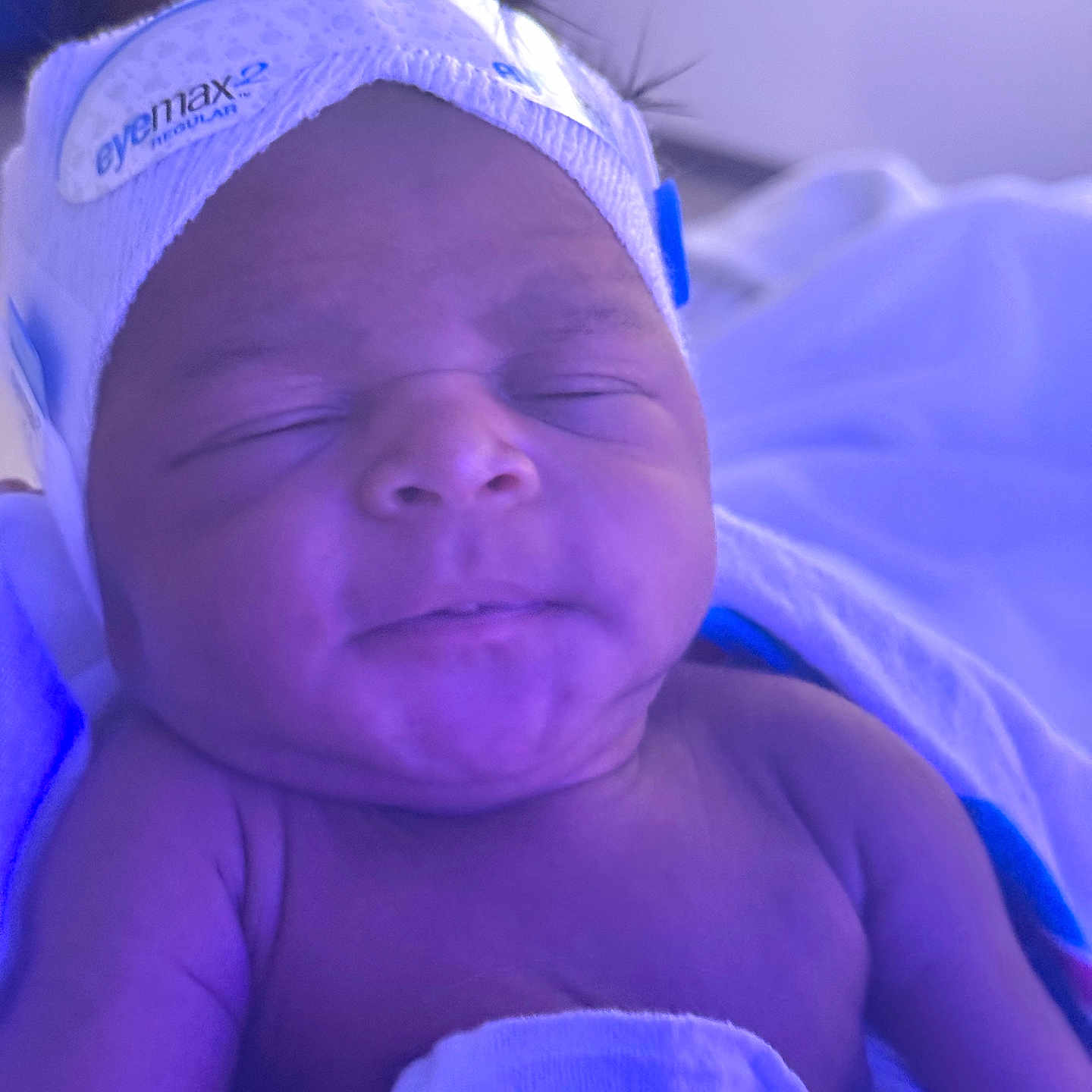 Nael joined the competition — help win amazing prizes! newborn, baby, infant, sleeping, portrait, face, hospital, cap, hat, blanket, bedding, blue_light, closeup, indoors, eyes_closed, peaceful, skin, head, child, photograph