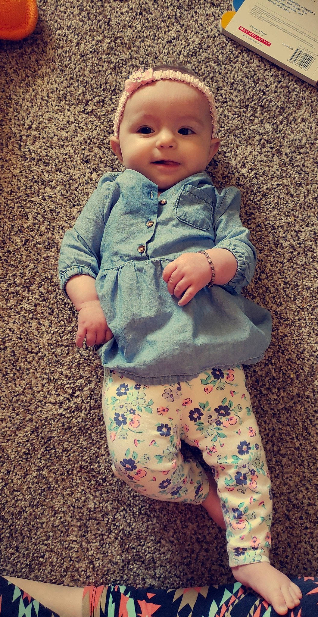 Carly Mae is registered to the contest to win money with this photo: child, cool, eye, fun, girl, human_behavior, infant, pattern, person, play, product, sitting, skin, textile, toddler