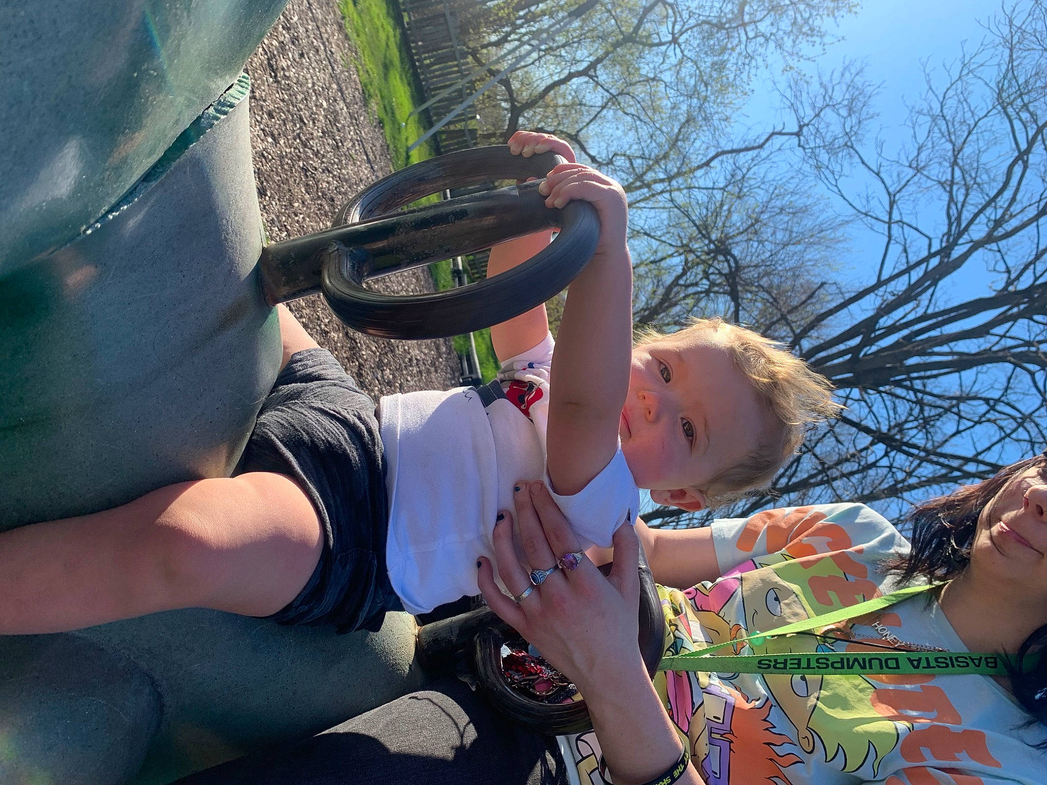 Alex is registered to the contest to win money with this photo: auto_part, automotive_tire, automotive_wheel_system, elbow, event, fun, grass, happy, hat, helmet, human_leg, leisure, person, personal_protective_equipment, plant, recreation, shorts, sky, t_shirt, thigh