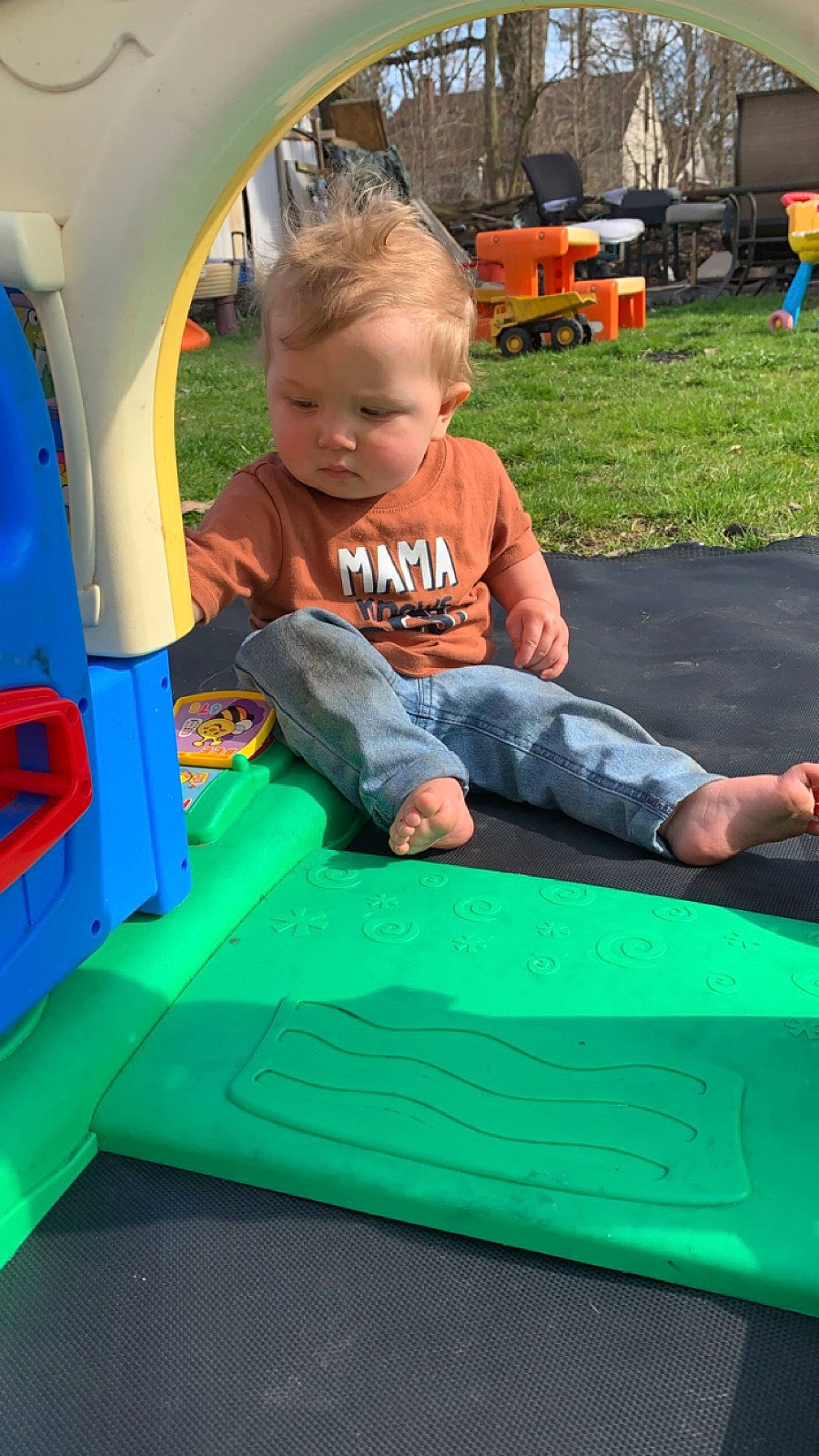 Alex is registered to the contest to win money with this photo: baby, baby_toddler_clothing, child, chute, city, fun, games, grass, green, inflatable, leisure, outdoor_play_equipment, person, play, playground, recreation, shorts, sitting, t_shirt, toddler