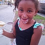 Amazin Miller joined the competition — help win amazing prizes! child, ice_cream, sidewalk, street, smiling, happy, outdoor, girl, summer, food, sweet, casual_clothing, curly_hair, playful, daytime, urban, background, vehicle, nature, fun