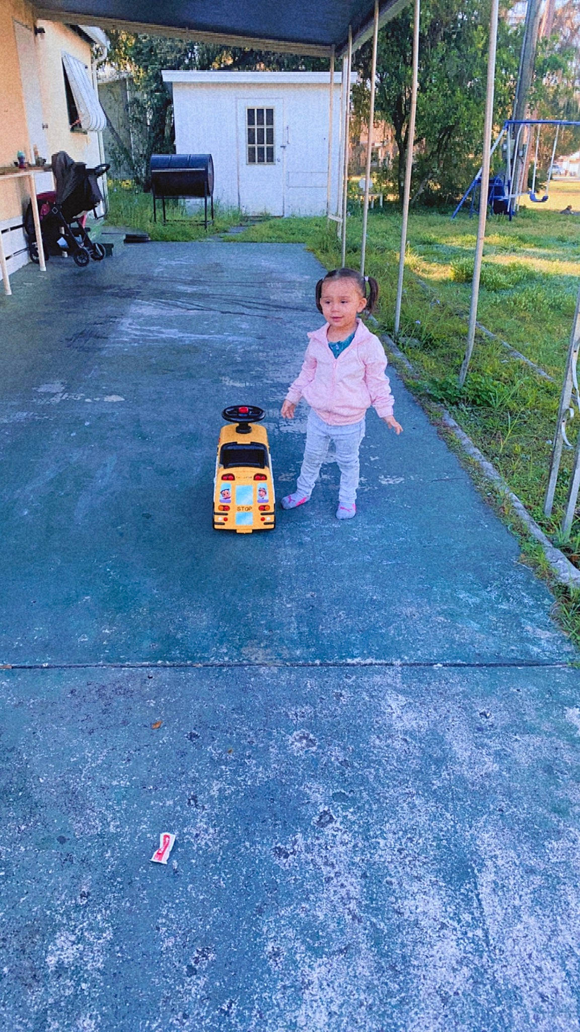 Ryleighe joined the competition — help win amazing prizes! asphalt, baby, chair, child, city, driveway, flooring, fun, grass, leisure, motor_vehicle, person, plant, play, recreation, road, road_surface, sidewalk, toddler, toy