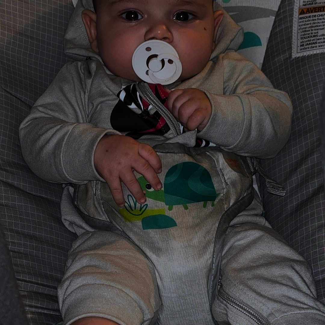 Ryan joined the competition — help win amazing prizes! baby, bodypart, car, car_interior, carseat, clothing, couch, face, finger, furniture, hand, head, homedecor, hosiery, person, photography, portrait, sock, transportation, vehicle