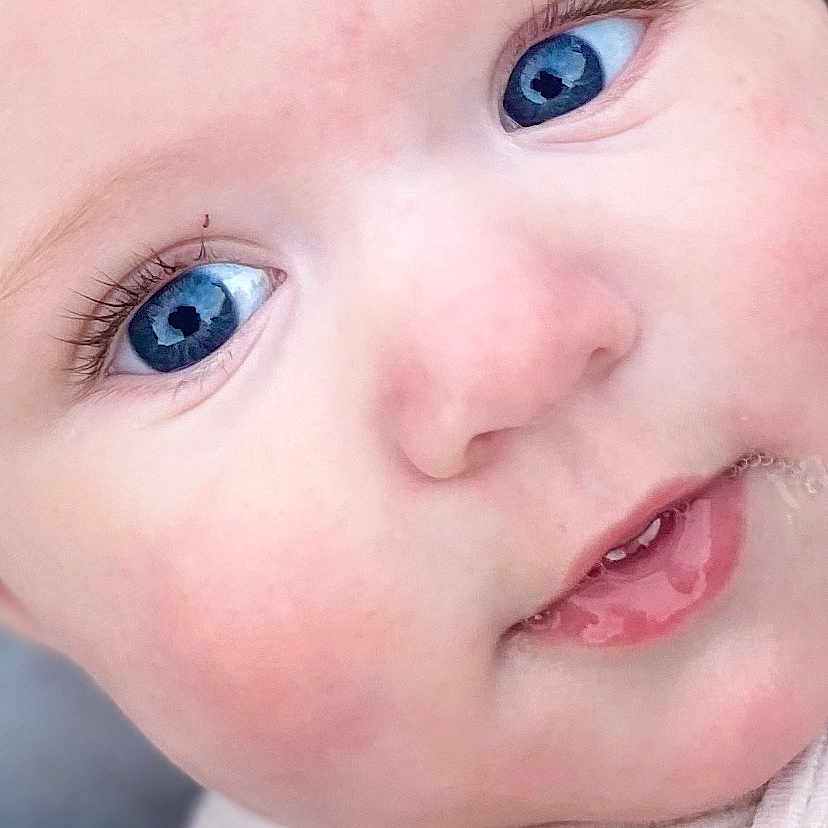 Gabriel participe au concours pour gagner de l'argent avec cette photo : apparel, baby, blue_eyes, child, close_up, cute, expression, eyelashes, fabric, face, head, infant, portrait, skin, smile, soft_skin, strap, teeth, texture, young