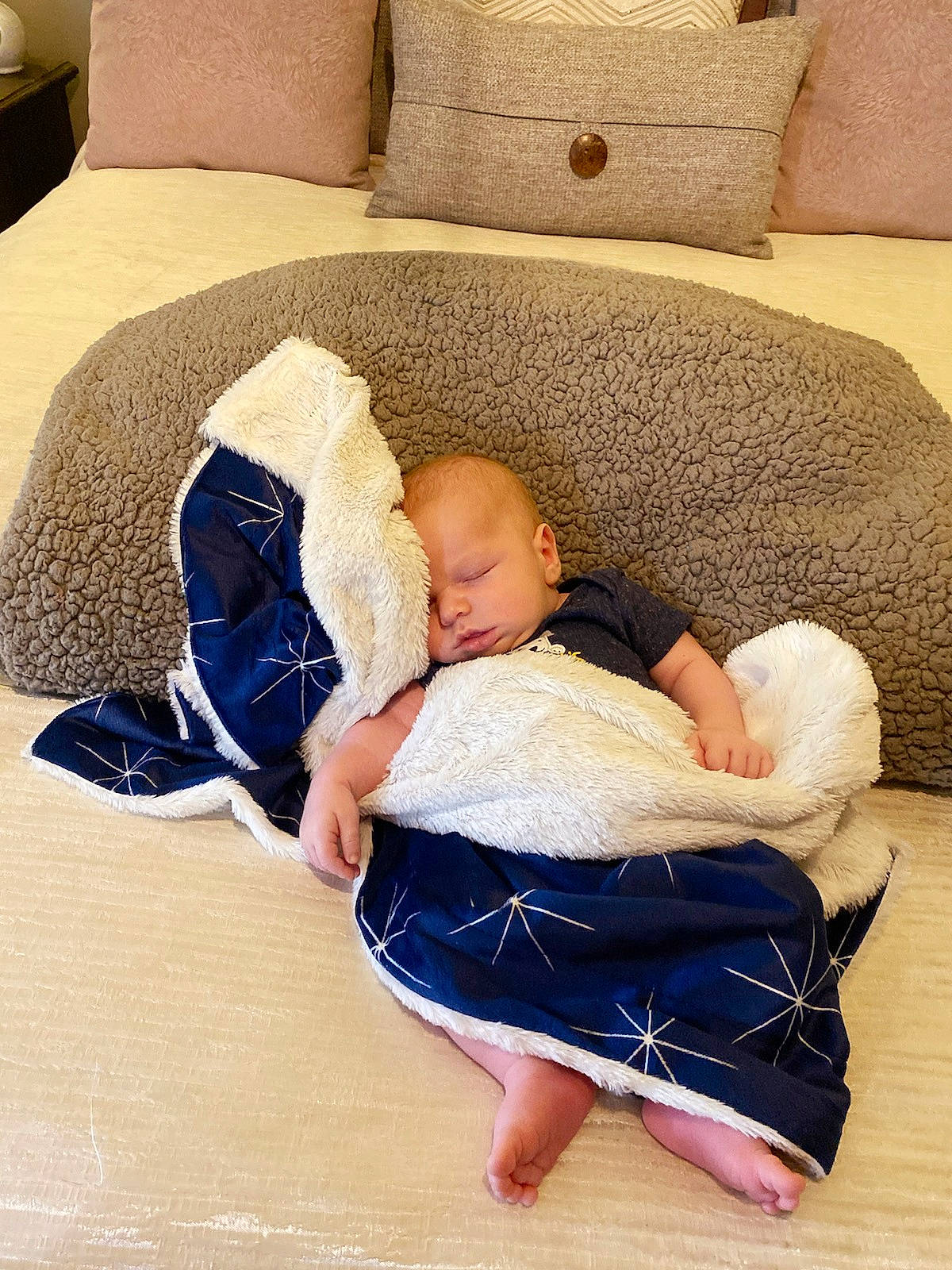 Lucian joined the competition — help win amazing prizes! baby, baby_products, baby_sleeping, baby_toddler_clothing, barefoot, child, comfort, couch, elbow, floor, flooring, foot, hardwood, head, leisure, linens, person, room, sitting, toddler