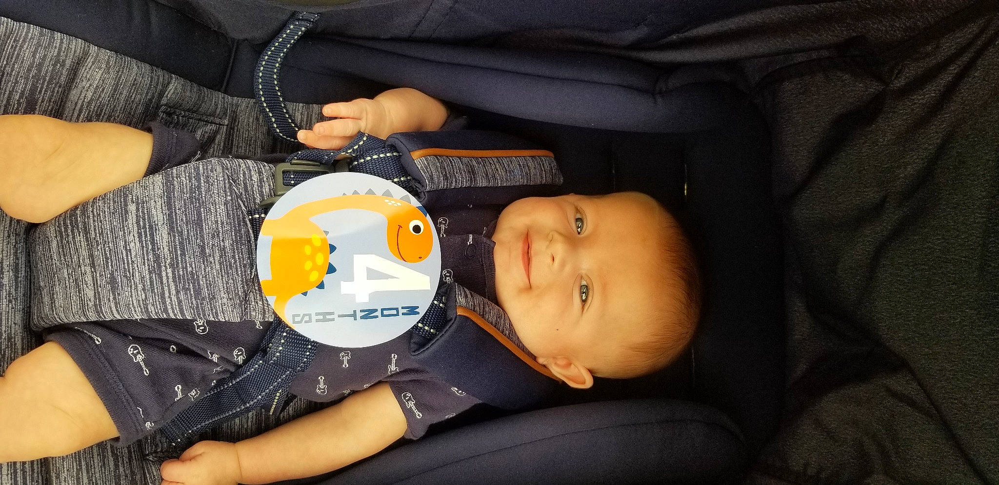 Ryker joined the competition — help win amazing prizes! baby, car_seat, child, joy, nap, person, sleep