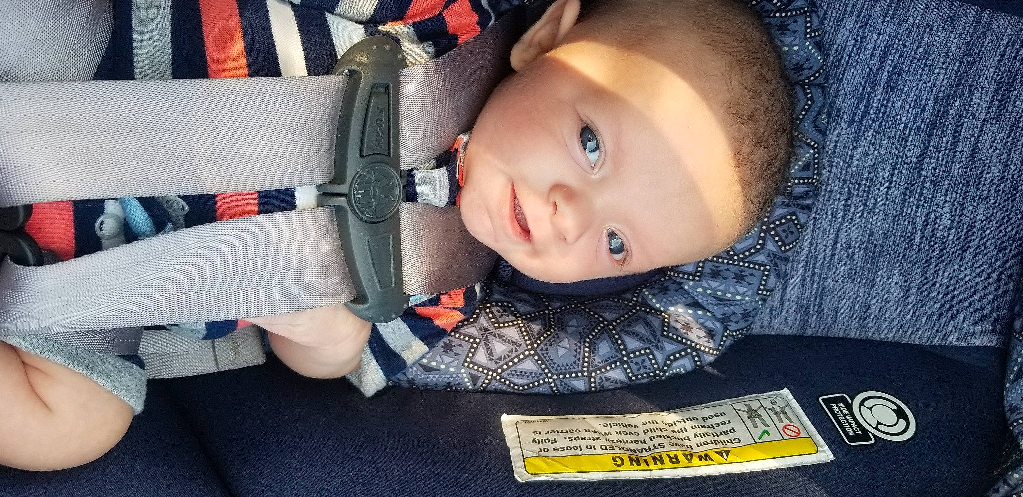 Ryker joined the competition — help win amazing prizes! auto_part, baby, car_seat, cheek, child, person, seat_belt, toddler