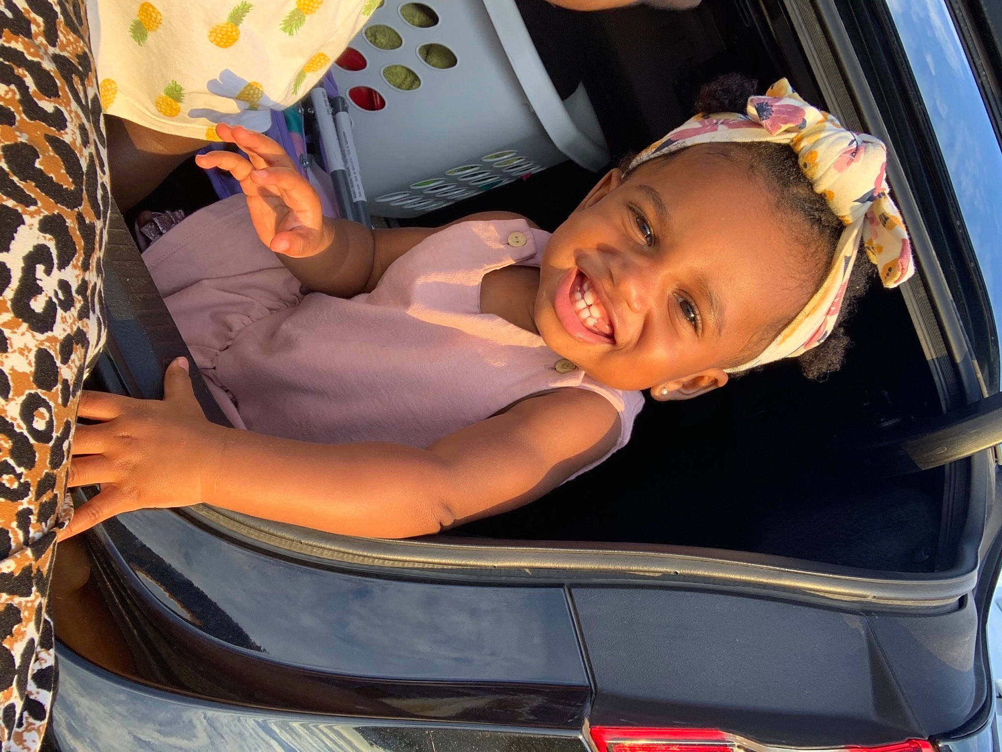 Danielle is registered to the contest to win money with this photo: auto_part, automotive_design, automotive_exterior, automotive_lighting, bumper, car_seat, car_seat_cover, comfort, cool, fun, happy, joy, leisure, motor_vehicle, person, personal_luxury_car, smile, tints_and_shades, toddler, trunk