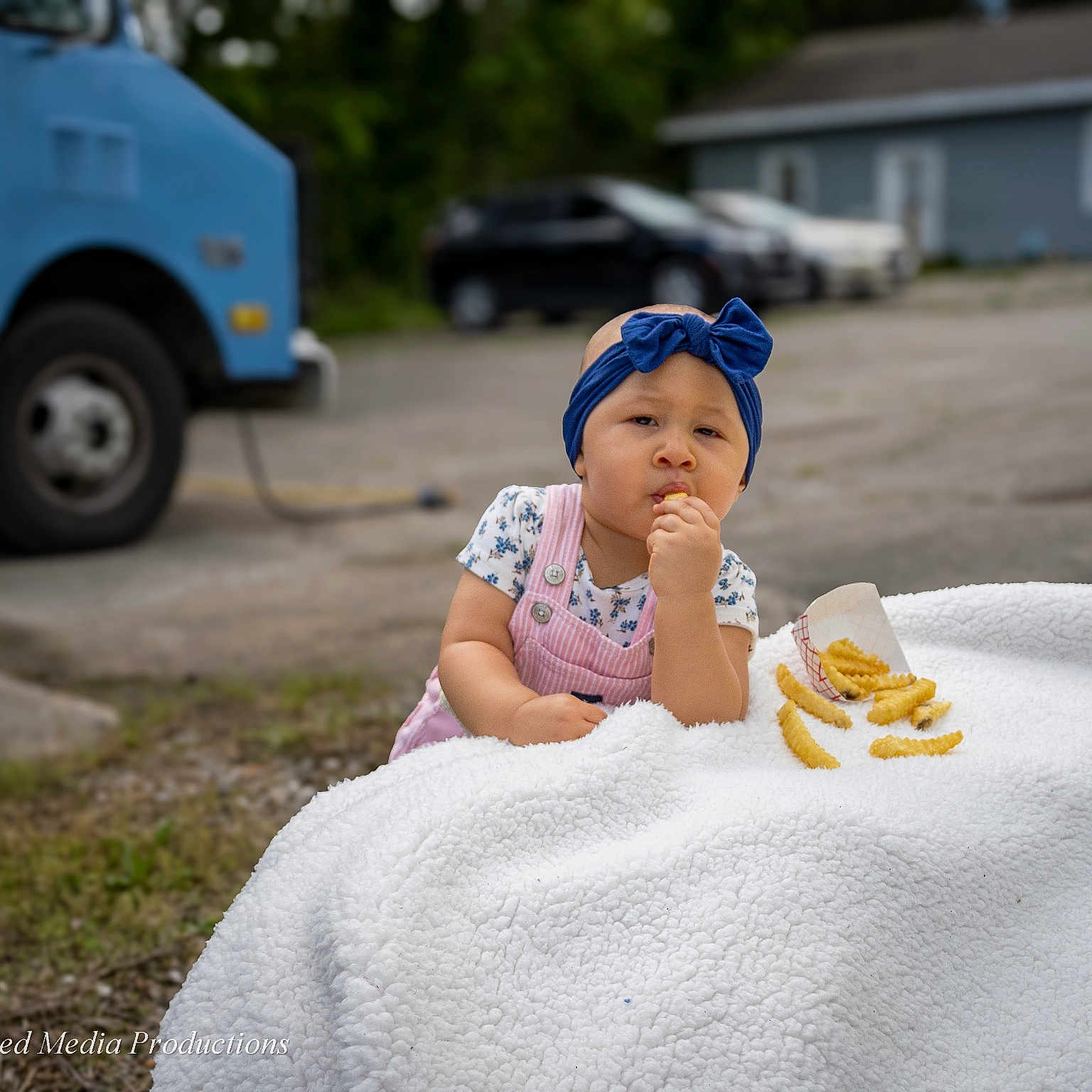 Briella is registered to the contest to win money with this photo: alloywheel, baby, bodypart, cap, car, carwheel, clothing, cream, face, finger, hand, hat, head, machine, person, spoke, tire, transportation, vehicle, wheel