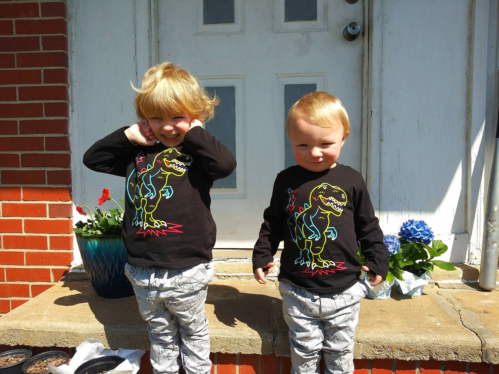 Tidus joined the competition — help win amazing prizes! brickwork, child, cool, door, electric_blue, eyewear, flooring, fun, grass, happy, joint, joy, leisure, people, person, plant, shoulder, sleeve, standing, t_shirt