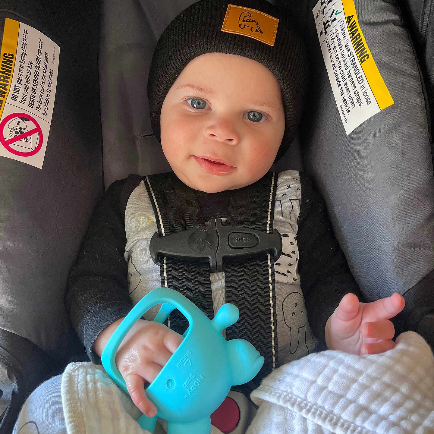 Jermaine is registered to the contest to win money with this photo: baby, bodypart, cap, car, clothing, coat, cushion, face, finger, furniture, hand, hat, head, homedecor, jacket, person, photography, portrait, transportation, vehicle