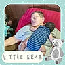 Caspian is registered to the contest to win money with this photo: baby, elderly_person, glasses, striped_clothing, cushion, red_cushion, reclining, indoor, wood_panel_wall, cartoon_bear, text_overlay, blue_background, polka_dots, toddler, resting, affection, family, cozy, cute, portrait