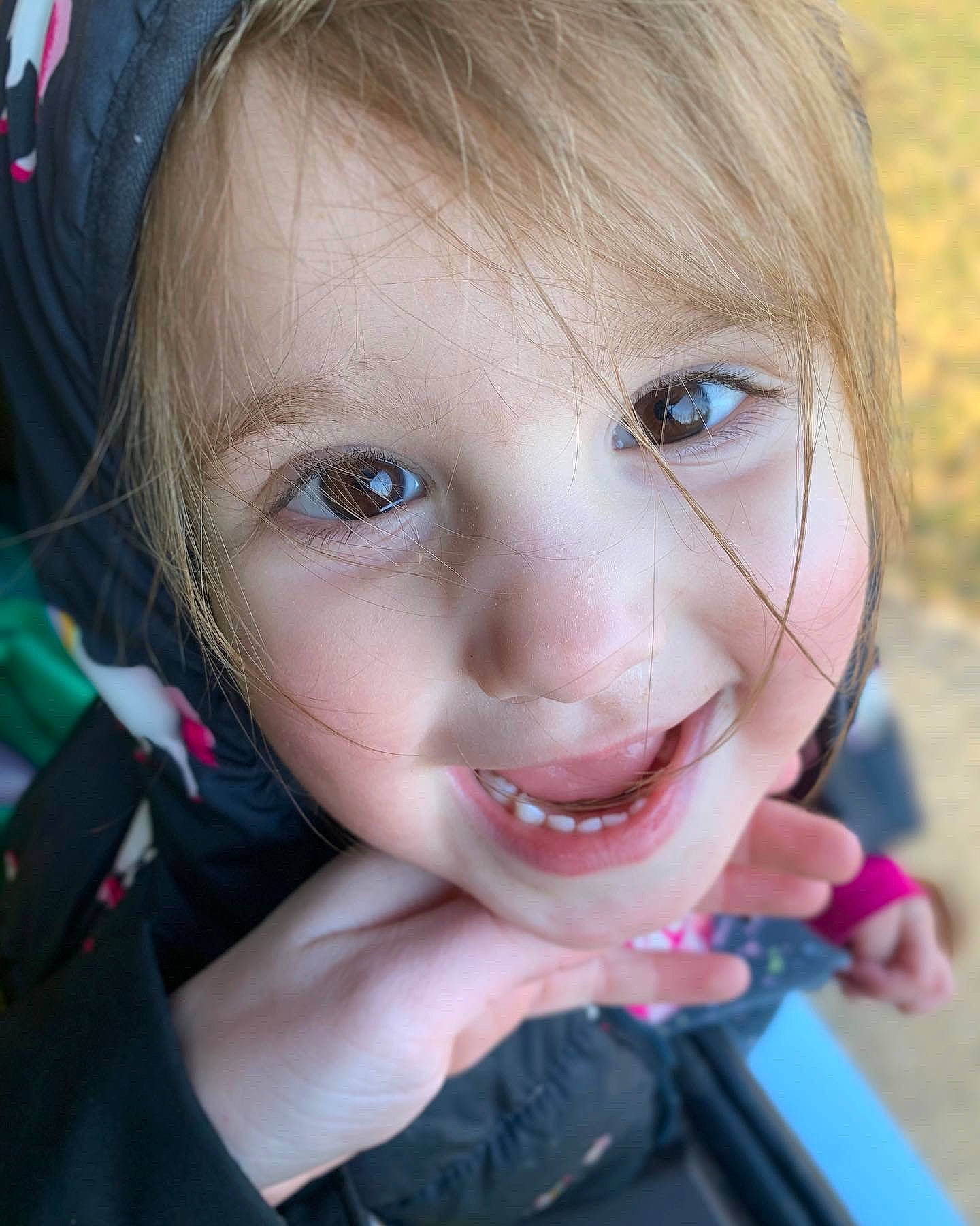 Addy is registered to the contest to win money with this photo: cheek, chin, cool, ear, eyebrow, eyelash, fun, grass, hair, happy, iris, jaw, joy, lip, mouth, neck, nose, person, pink, skin