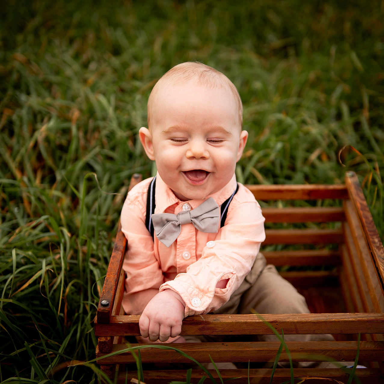 Salem Young joined the competition — help win amazing prizes! accessories, baby, babylaughing, box, crate, face, formalwear, furniture, grass, happy, head, laughing, person, photography, plant, portrait, sitting, smile, tie, wood