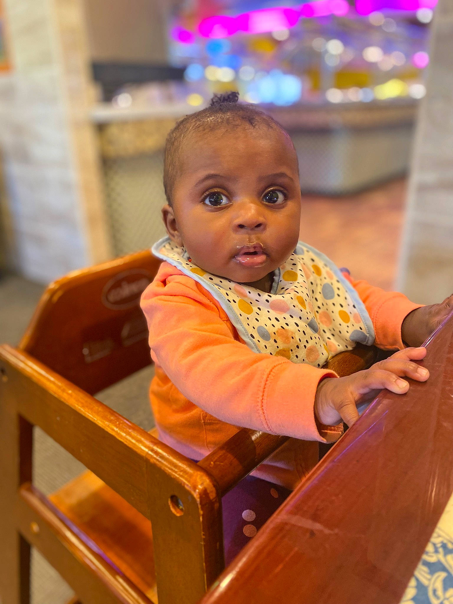 Dream is registered to the contest to win money with this photo: baby, baby_toddler_clothing, chair, cheek, child, eye, fun, happy, iris, leisure, person, room, sitting, skin, surprise, toddler, vacation, wood