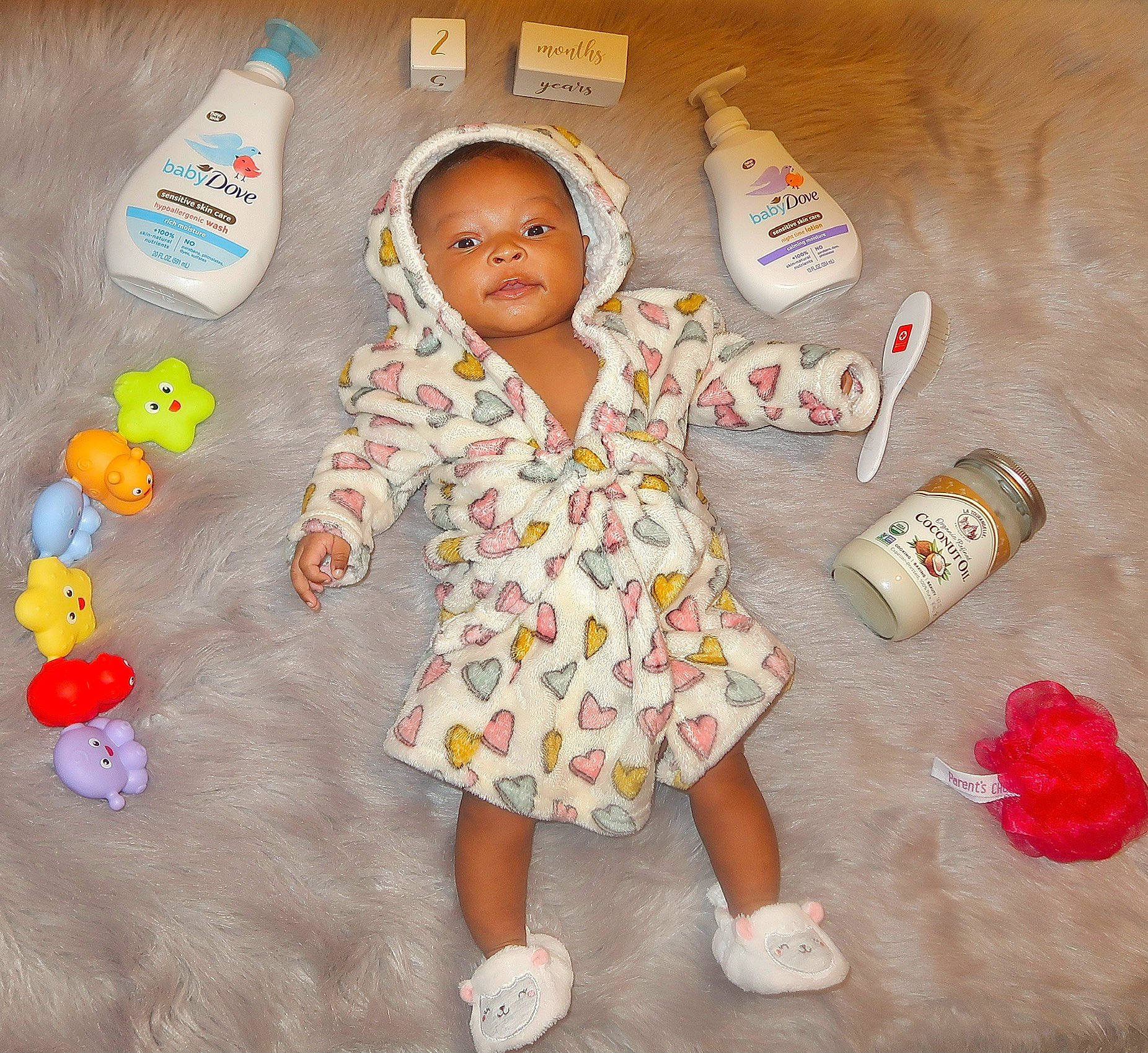 Malaya is registered to the contest to win money with this photo: baby_toddler_clothing, baby_toys, child, drinkware, finger, fun, gesture, happy, linens, pattern, person, pink, play, room, sandal, sleeve, t_shirt, thumb, toddler, toy