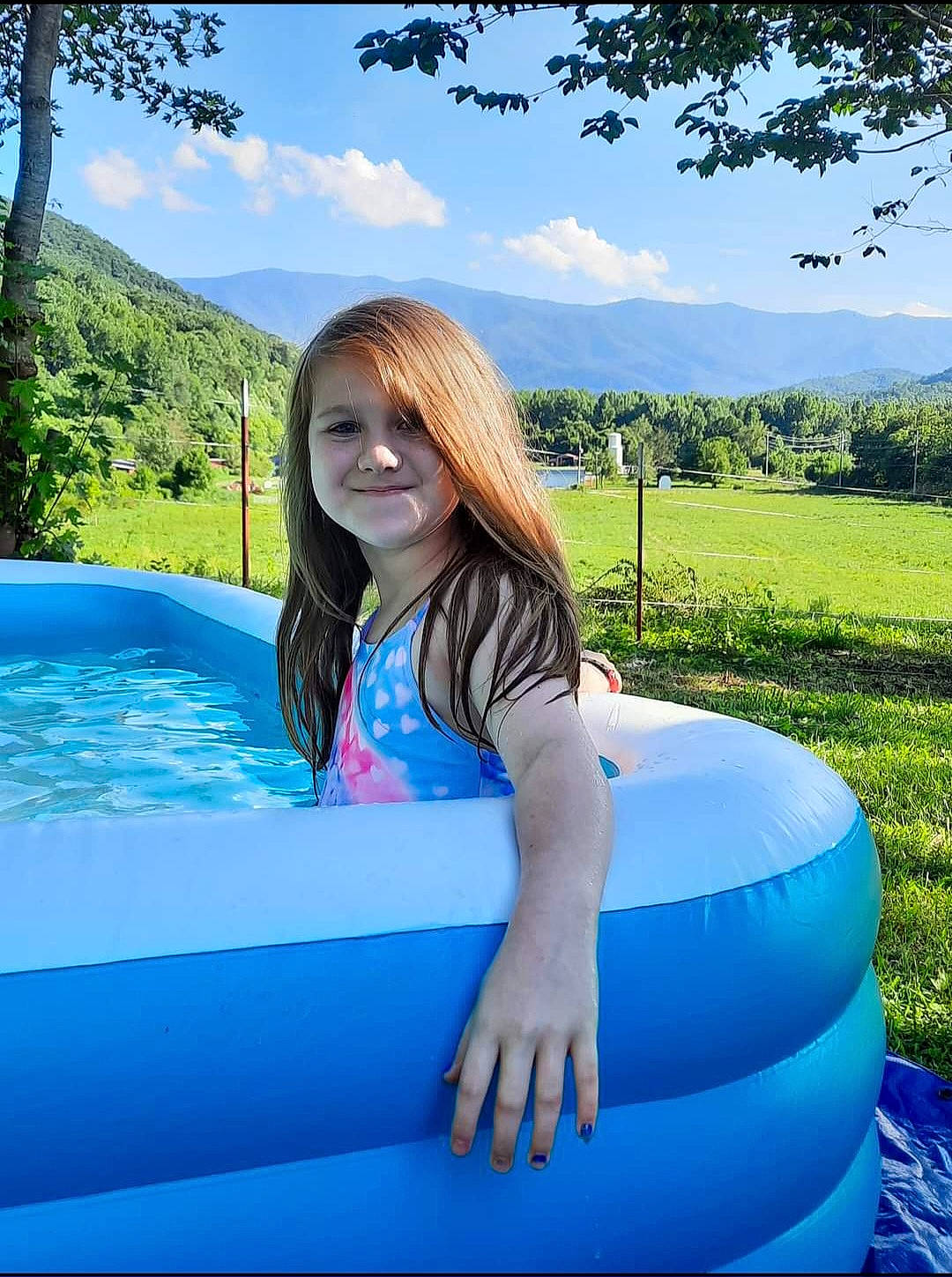 Carolina joined the competition — help win amazing prizes! black_hair, blue, botany, cloud, electric_blue, flash_photography, fun, grass, green, happy, human_leg, joy, leisure, people_in_nature, person, plant, recreation, sky, smile, thigh