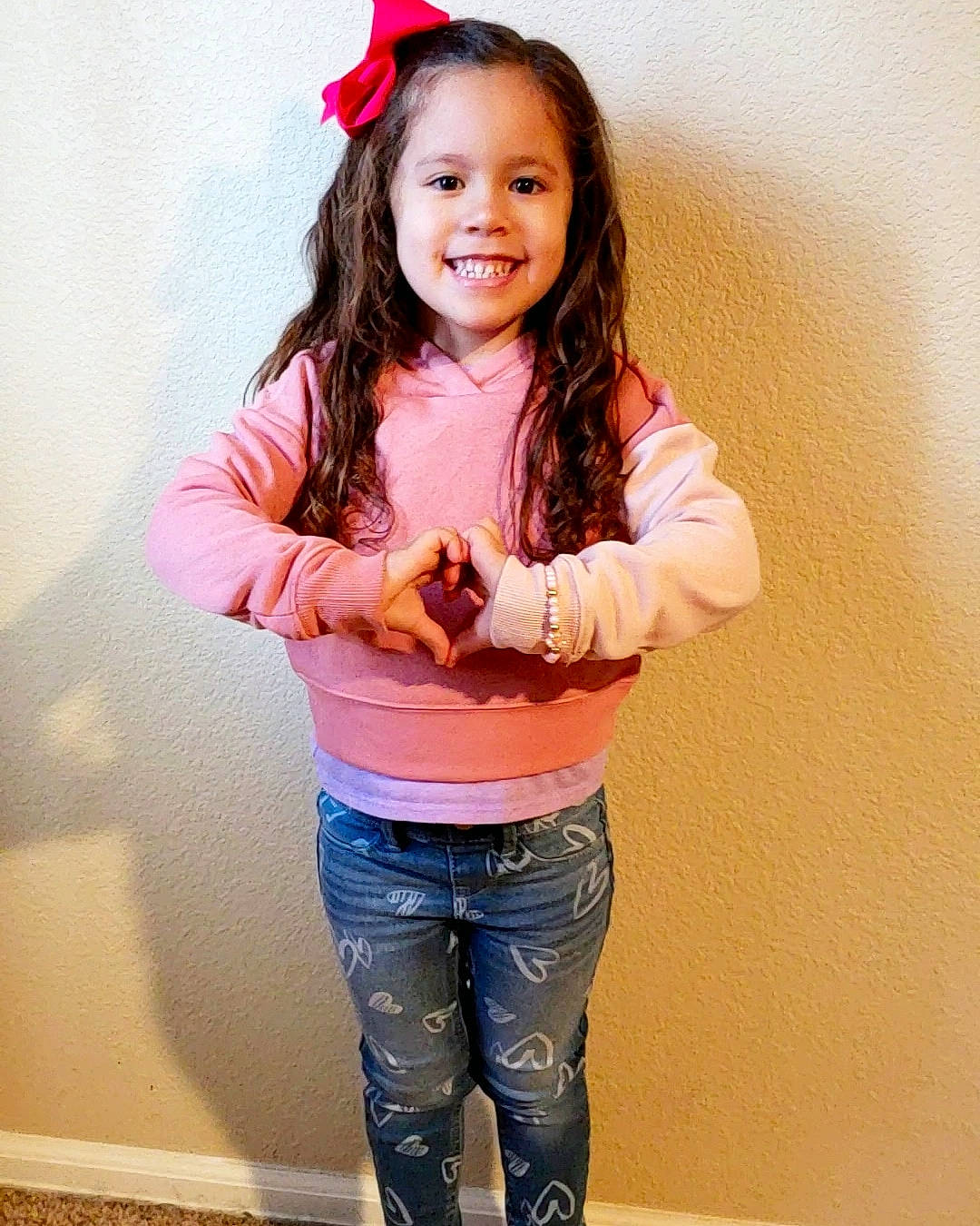 Emry joined the competition — help win amazing prizes! chin, clothing, cool, elbow, eye, facial_expression, flash_photography, fun, gesture, hair, hairstyle, happy, head, jeans, joy, person, pink, skin, sleeve, smile