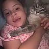 Snowflake joined the competition — help win amazing prizes! affection, cat, child, close_up, comfort, cozy, cute, fluffy, gray_cat, heart_pattern, hugging, indoor, pajamas, pet, pink, portrait, sleepwear, smiling, white_paws, young_child