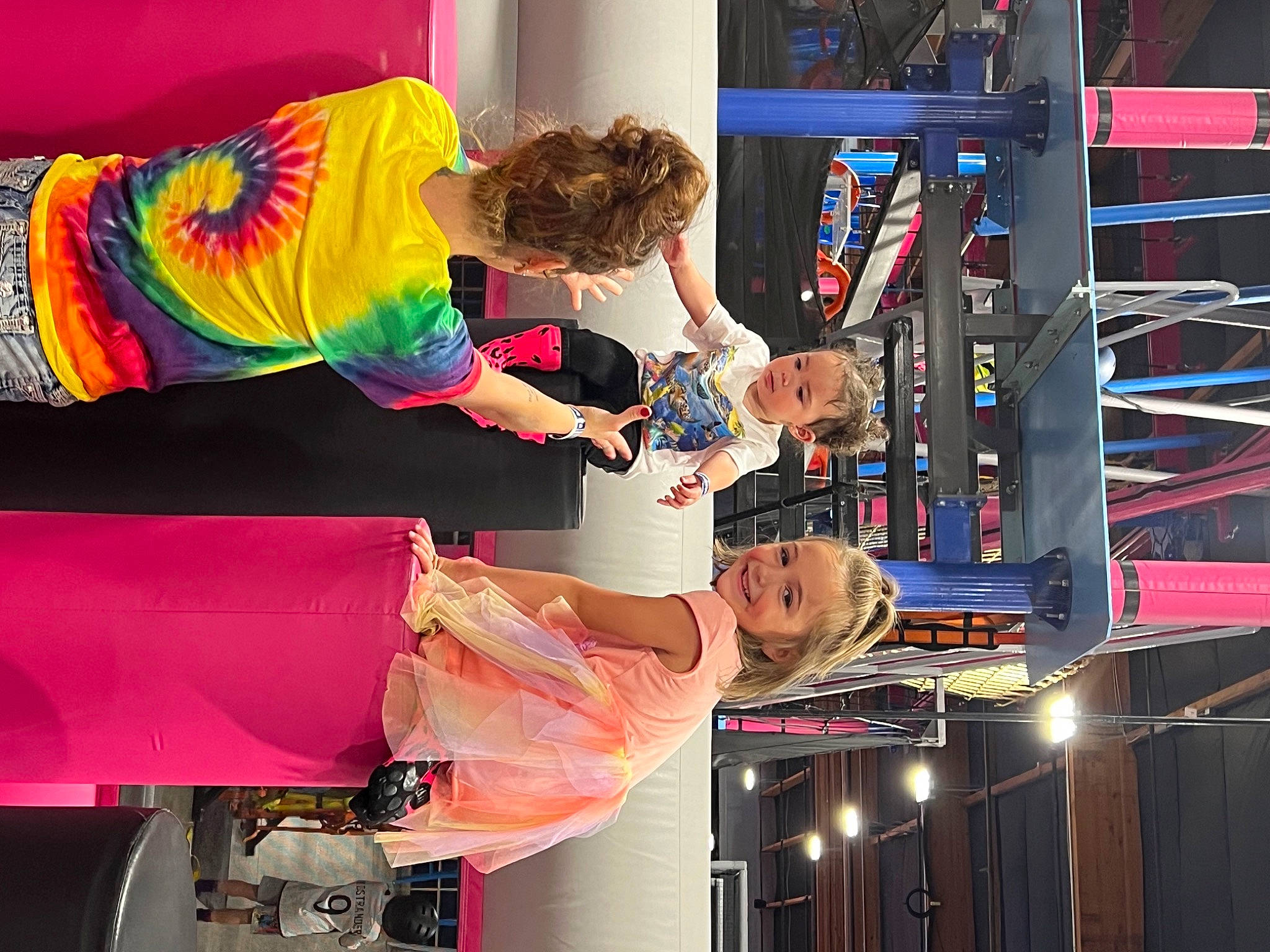 Braelynn is registered to the contest to win money with this photo: engineering, entertainment, event, fashion_design, fun, joy, leisure, machine, magenta, performance_art, performing_arts, person, room, shelf, shelving, standing, t_shirt, visual_arts