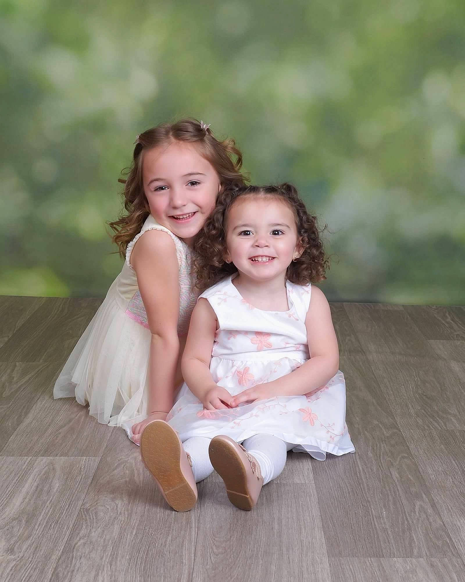 Reyna joined the competition — help win amazing prizes! blond, child, dress, event, eye, face, facial_expression, flash_photography, fun, grass, happy, head, iris, joy, people_in_nature, person, plant, sitting, skin, smile