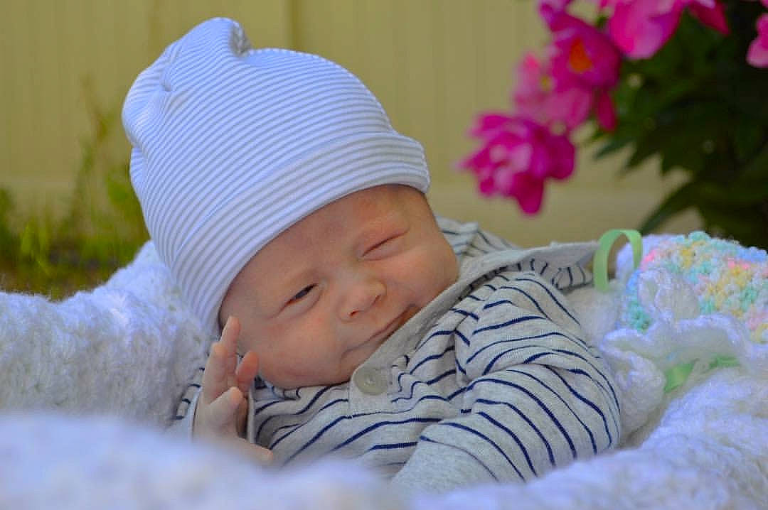 Renzo is registered to the contest to win money with this photo: baby, baby_sleeping, baby_toddler_clothing, beanie, cap, cheek, child, comfort, flower, grass, happy, hat, headwear, knit_cap, linens, person, plant, portrait_photography, room, skin