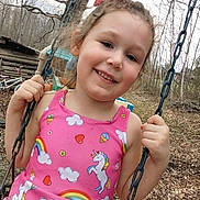 Rosalia is registered to the contest to win money with this photo: child, girl, swing, outdoor, playground, smile, pink_dress, unicorn, rainbow, chains, trees, wooden_structure, happy, holding, nature, fall_leaves, casual, cute, portrait, daylight