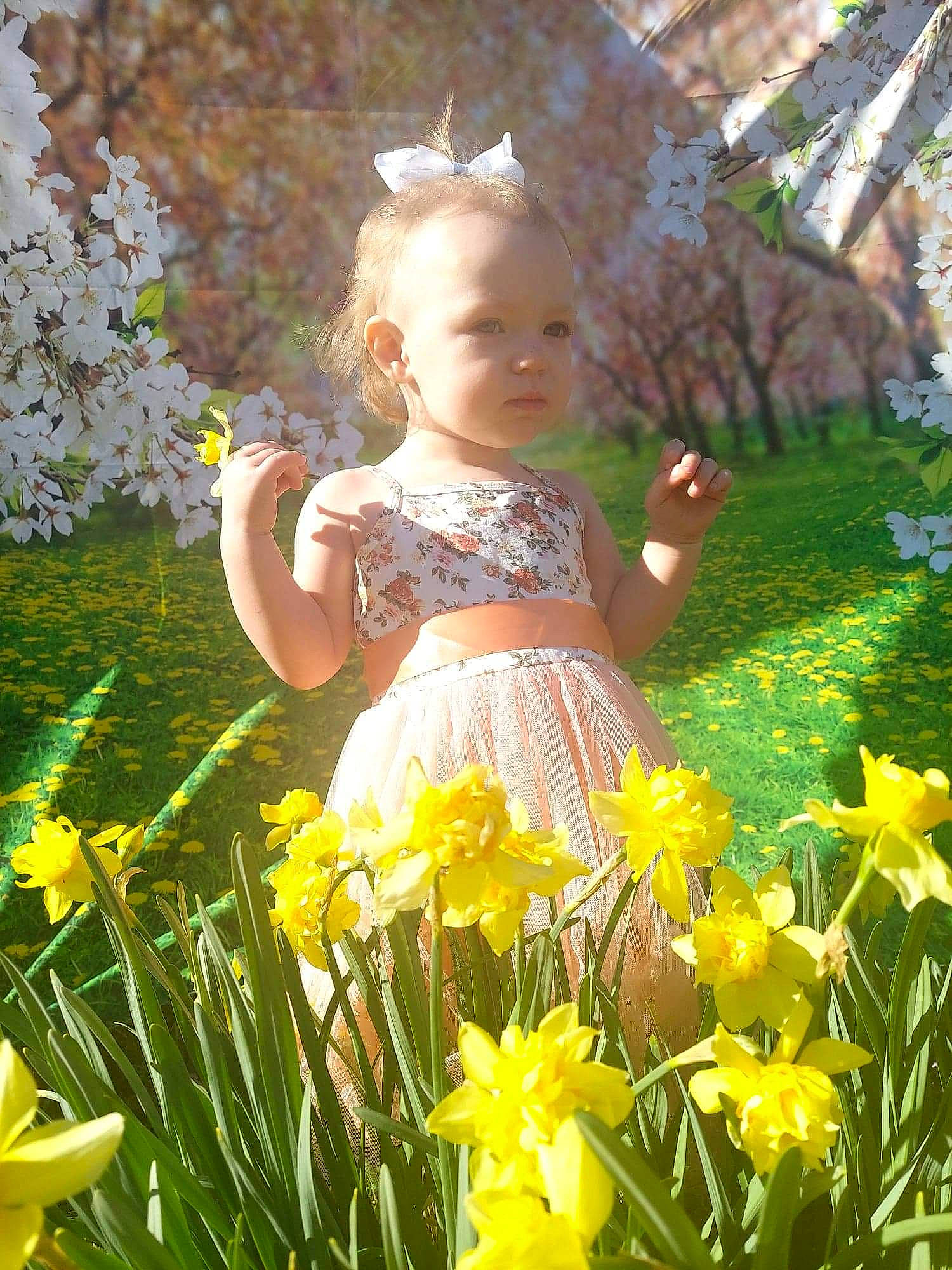 Layla joined the competition — help win amazing prizes! annual_plant, baby_toddler_clothing, botany, eye, flower, flowering_plant, grass, happy, head, iris, landscape, leaf, meadow, people_in_nature, person, petal, plant, shrub, sunlight, toddler